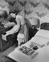 Vintage Woman Putting Laundry Away